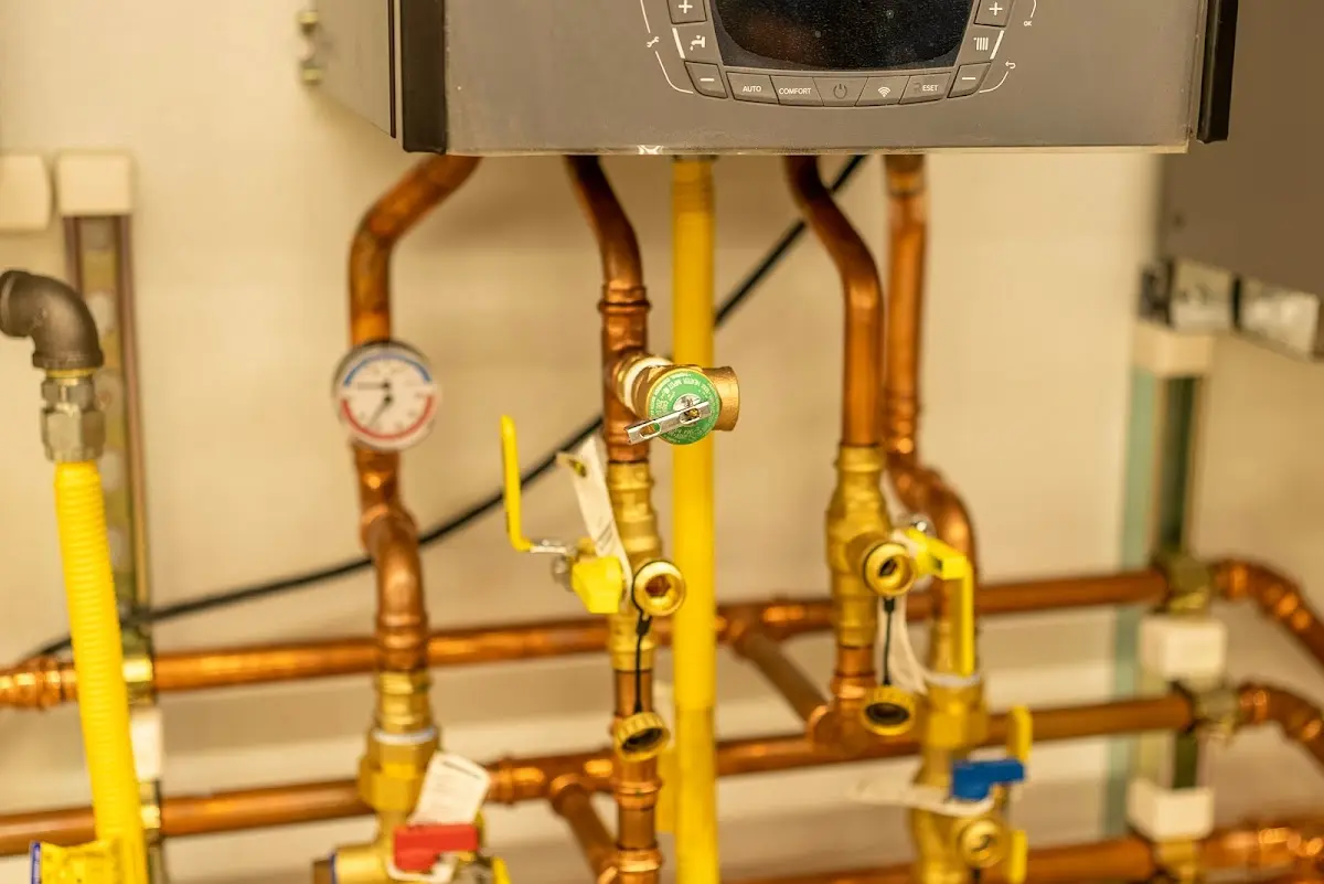 Licensed technician providing Backflow Prevention for a homeowner in Stowe